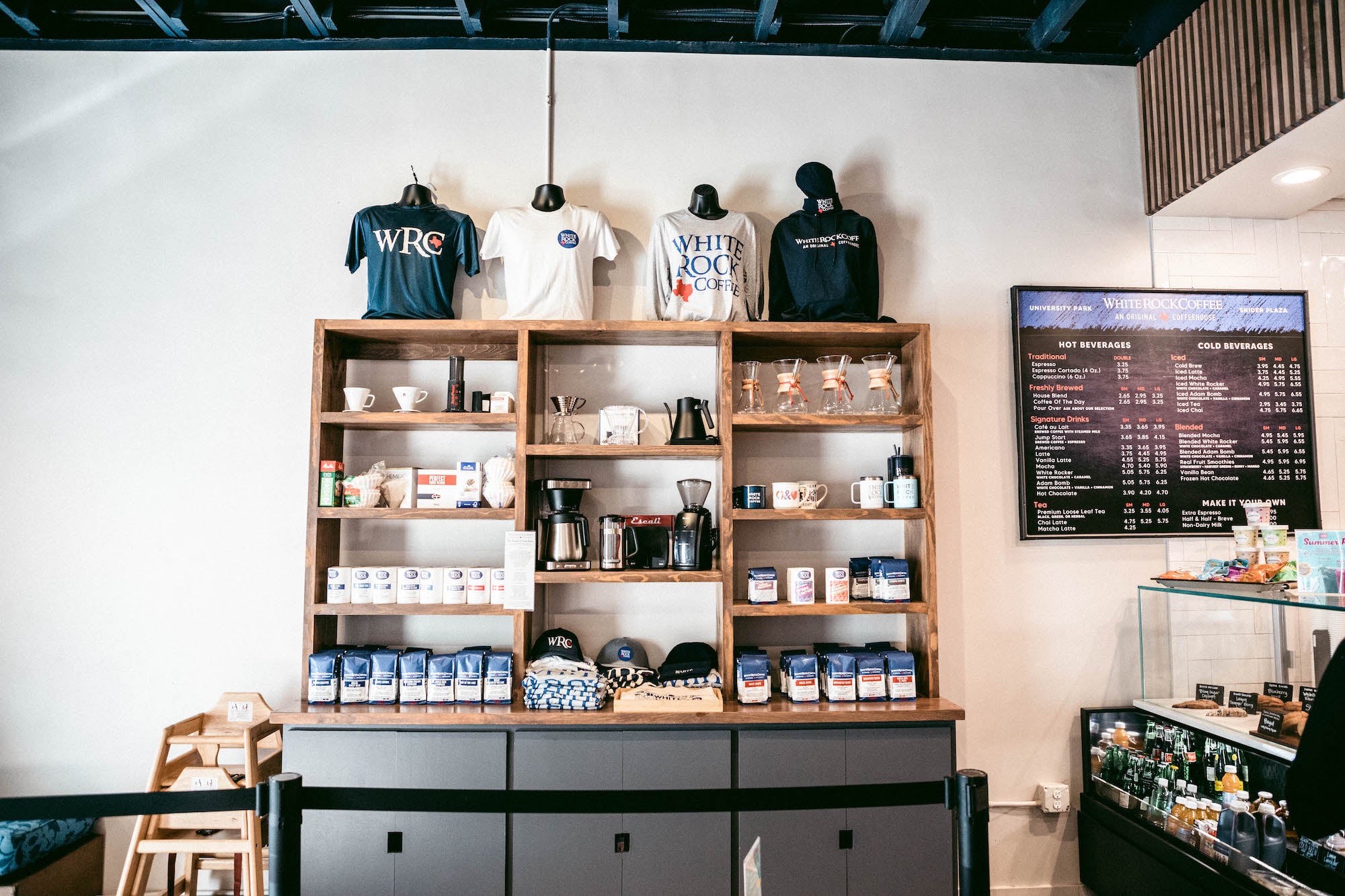 White Rock Coffee University Park Merchandise Wall
